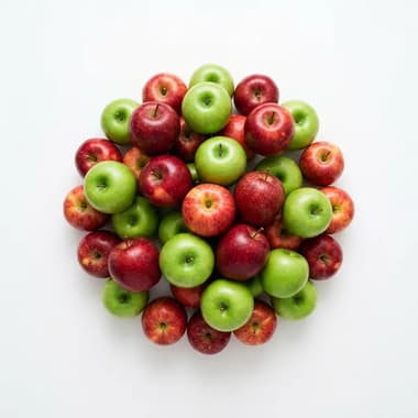 A round pile of whole red and green apples on a plain white background