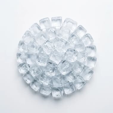 A round pile of clear ice cubes on a plain white background